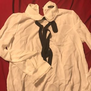 White blouse with black accent tie